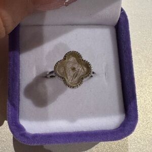 Golden rutilated stone on 925 silver setting

Adjustable